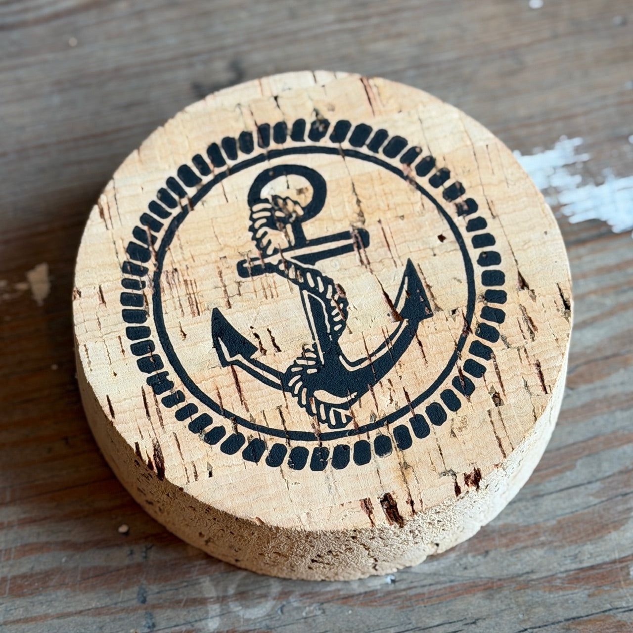 Upcycled cork drink coasters with hand-printed anchor design
