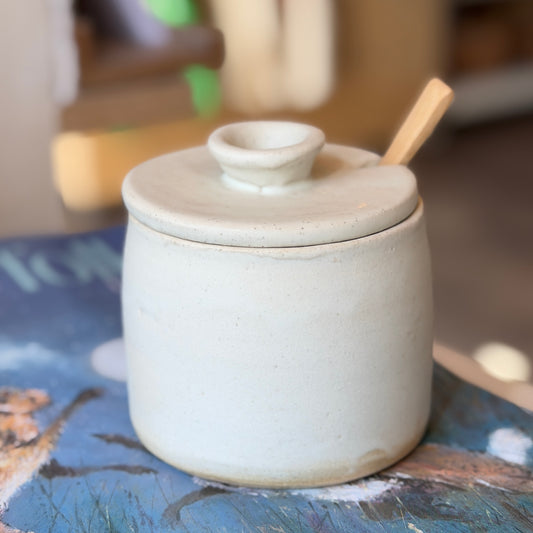 Lidded jar with wooden spoon