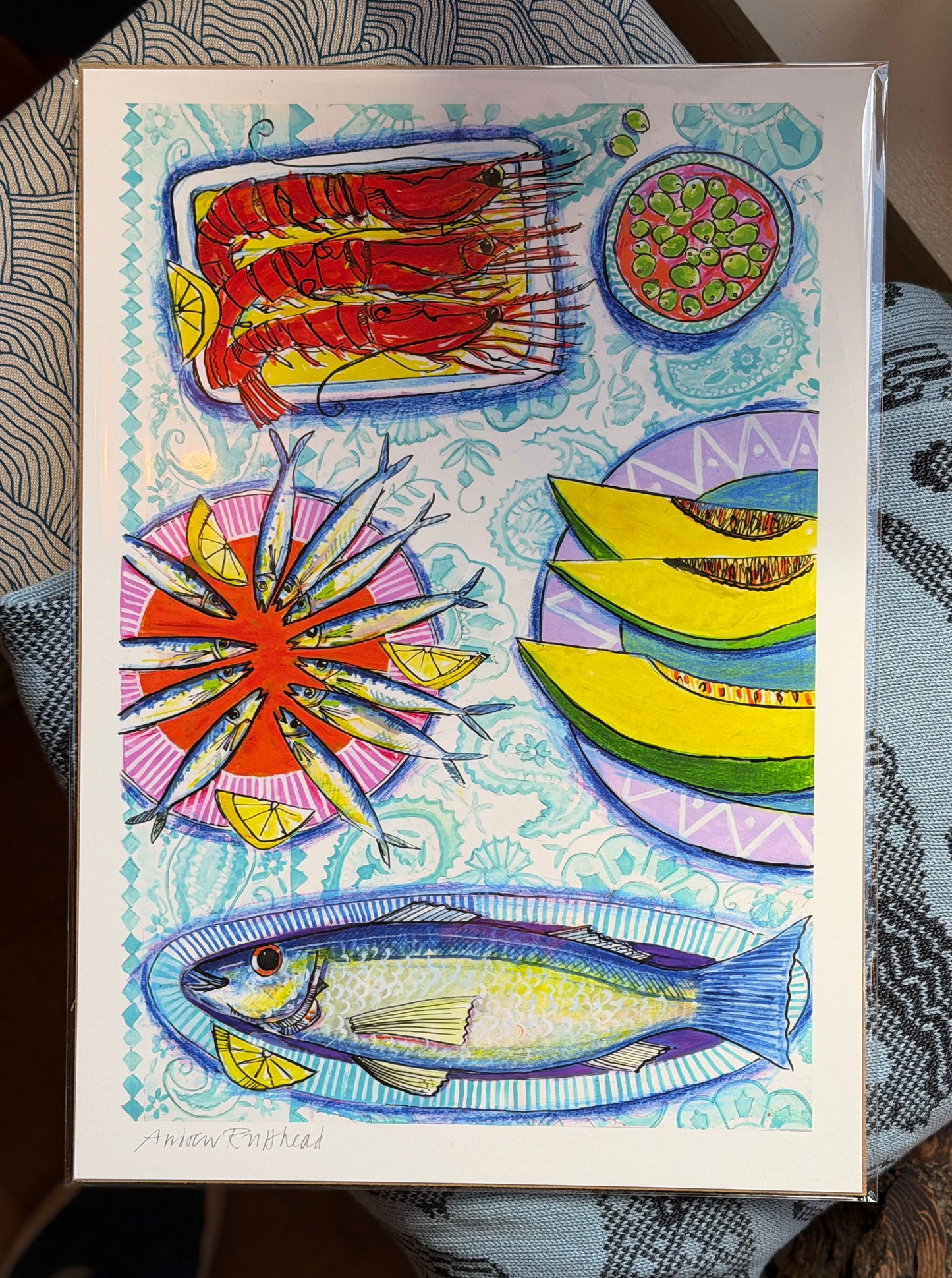 Seafood on turquoise tablecloth