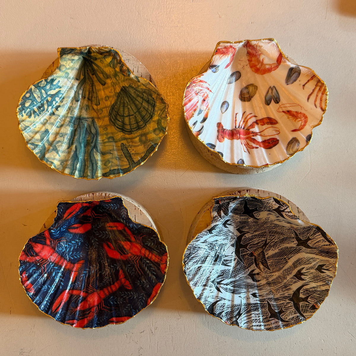 Decoupaged Scallop Shells set into cork base - various designs