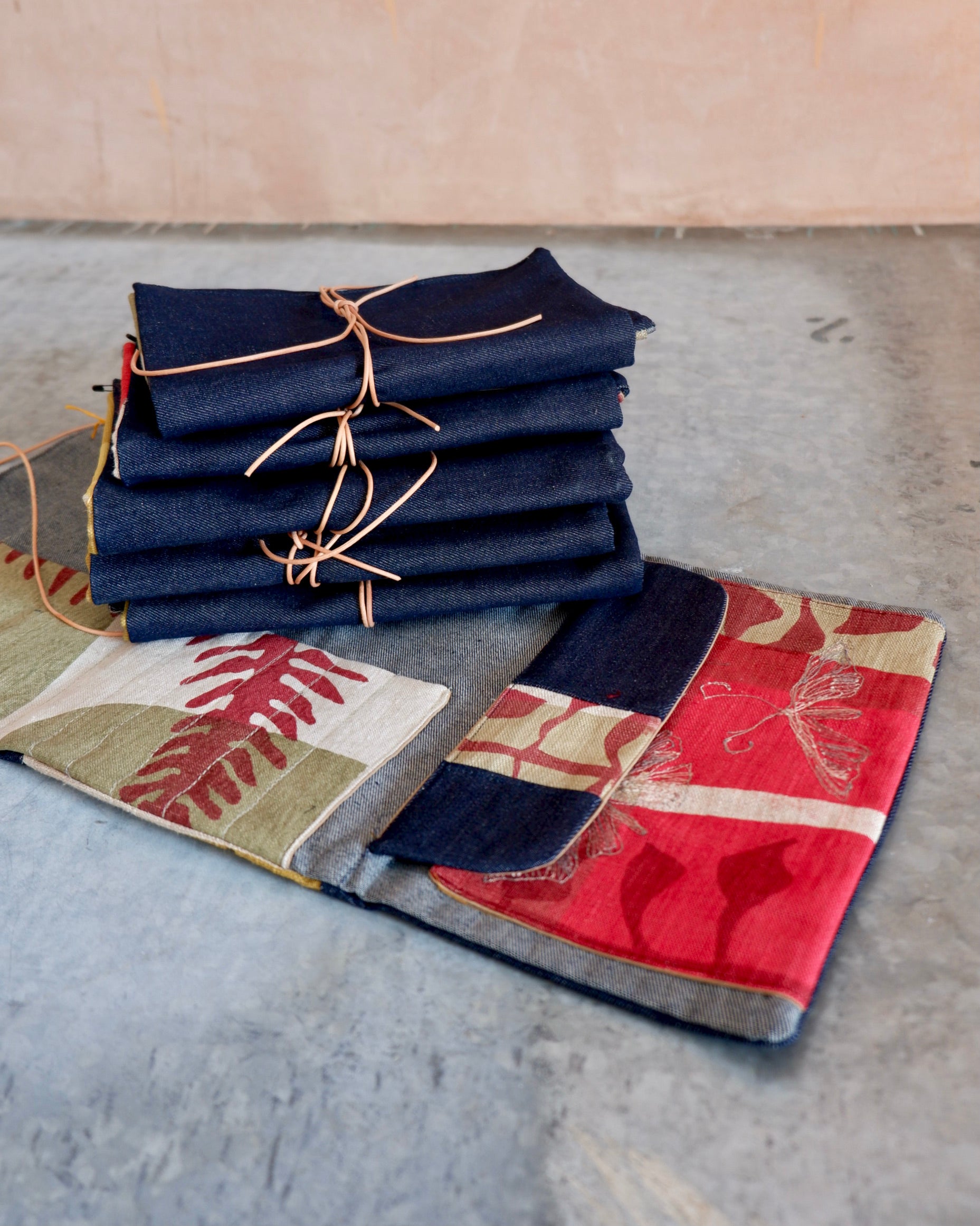 anna osbourne the speculating rook textiles embroidery screen print homeware Screenprinted linen and denim artist's tool wrap